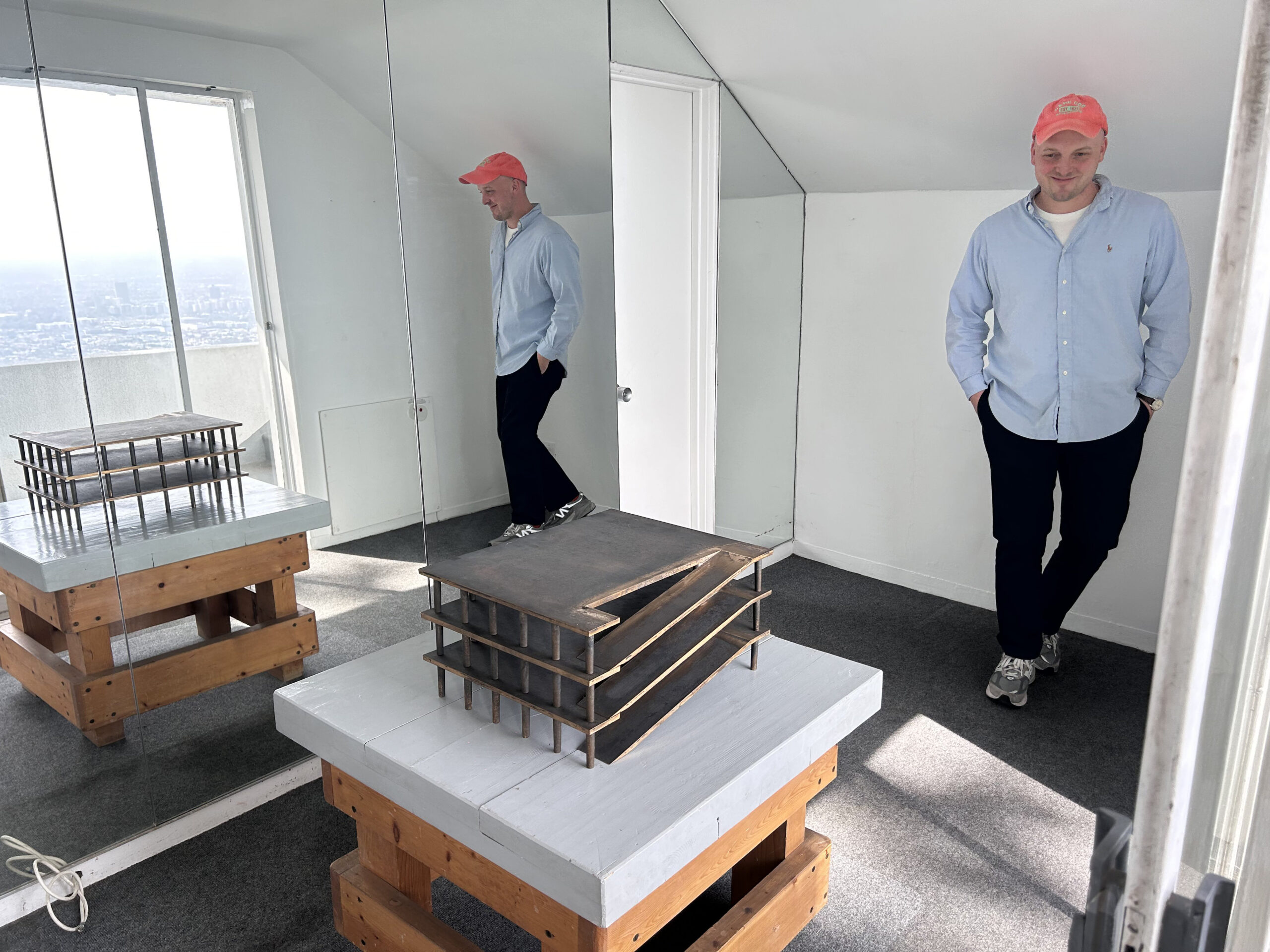 Okey Dokey Konrad Fischer director Tyler Murphy with Rita McBride’s sculpture Parking Garage (M), 2011.