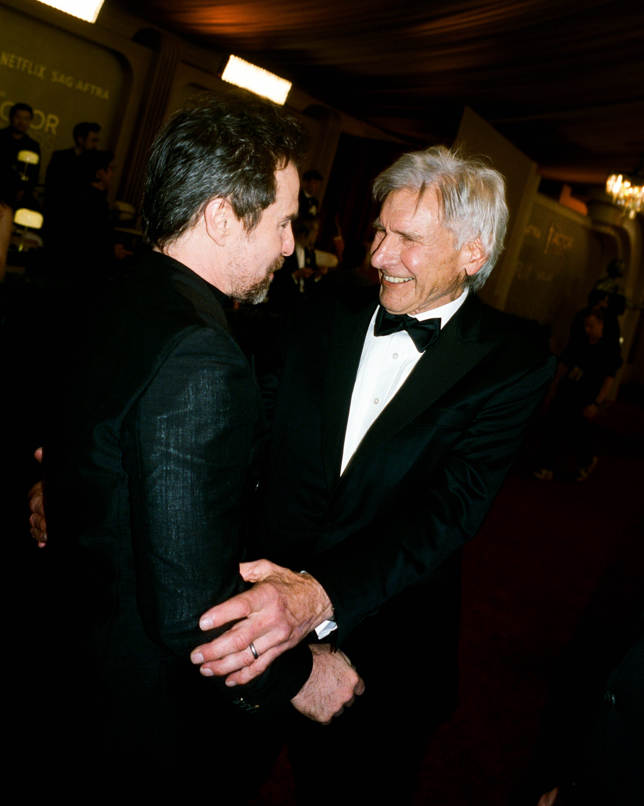 Sam Rockwell and Harrison Ford on the Actor Awards red carpet