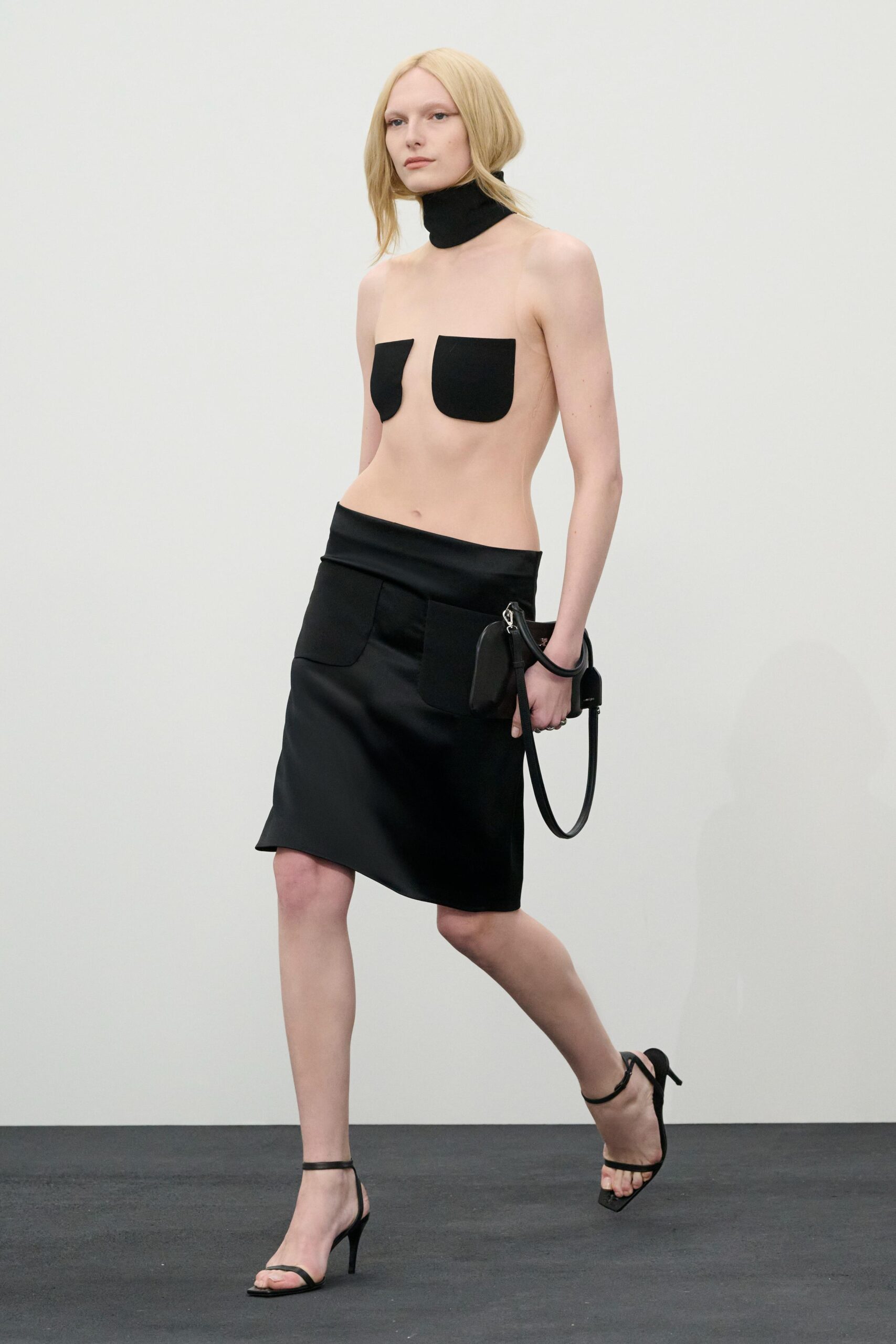 Alex Consani walks in the Courrèges Fall/Winter 2026 show