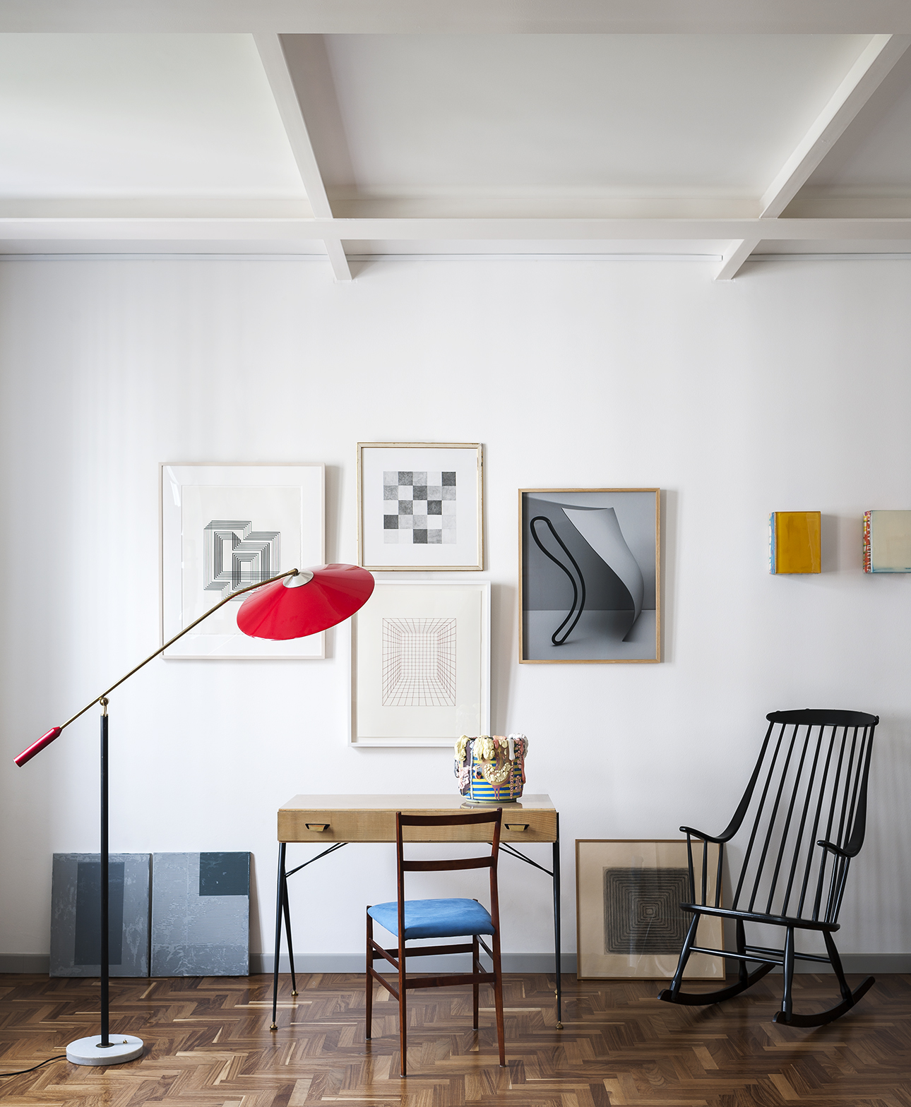 The collection of Nicole-Saikalis Bay is presented in her palazzo in Milan, a mixture of printed drawings and furniture is shown