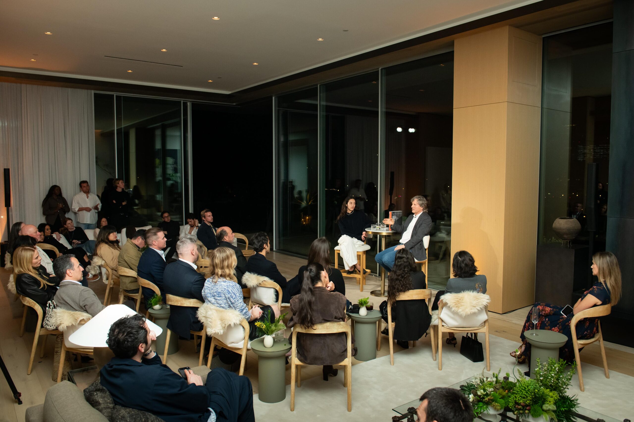 Guests sit for a panel discussion with Mara Veitch and Tom Kundig