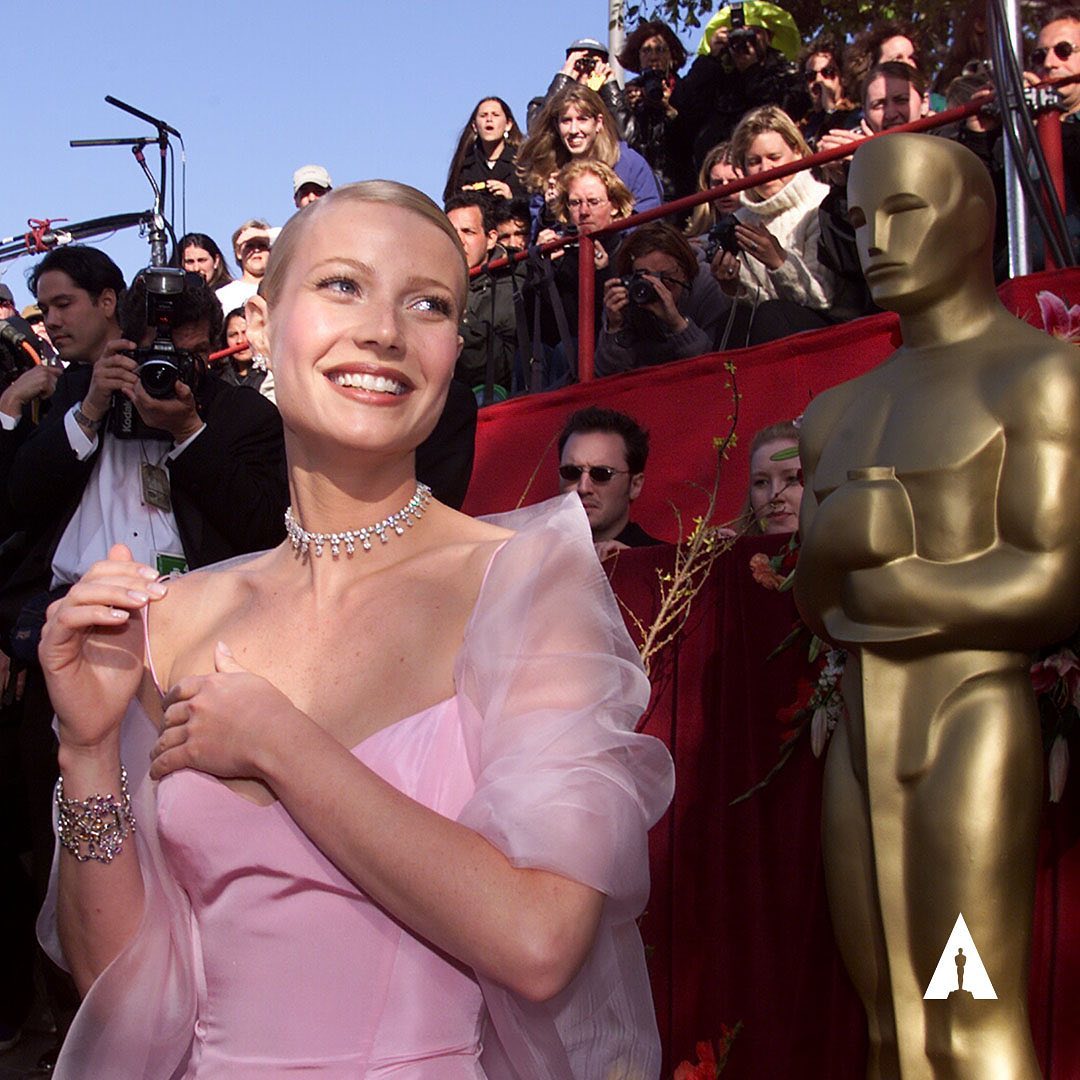 Gwyneth Paltrow walks the red carpet at the Academy Awards