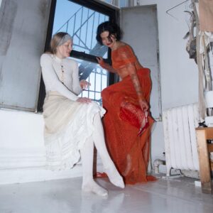 Zoe Gustavia Anna Whalen dresses Cato Young in her garments in a white-washed studio filled with light