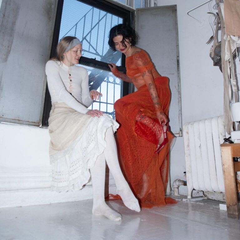 Zoe Gustavia Anna Whalen dresses Cato Young in her garments in a white-washed studio filled with light