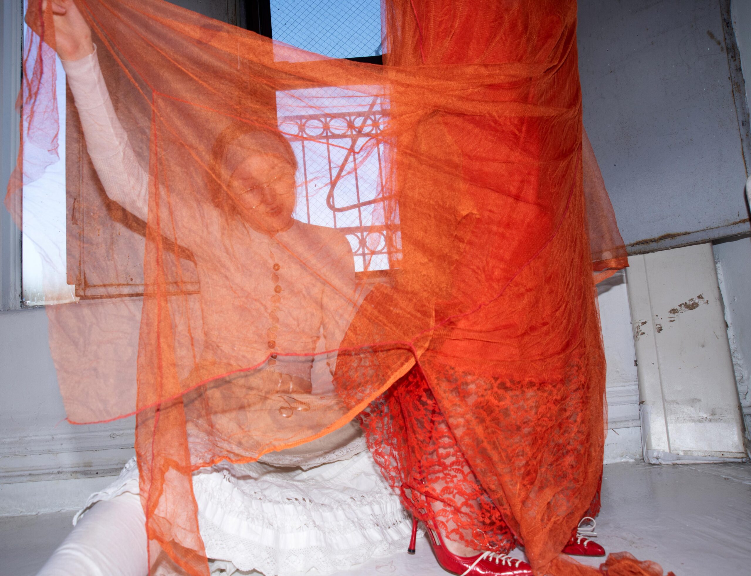 Zoe Gustavia Anna Whalen dresses Cato Young in her garments in a white-washed studio filled with light