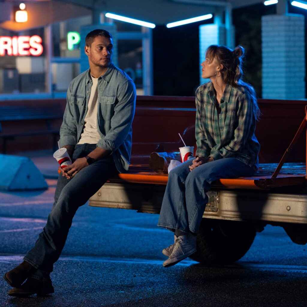(from left) Ledger Ward (Tyriq Withers) and Kenna Rowan (Maika Monroe) in REMINDERS OF HIM, directed by Vanessa Caswill.
