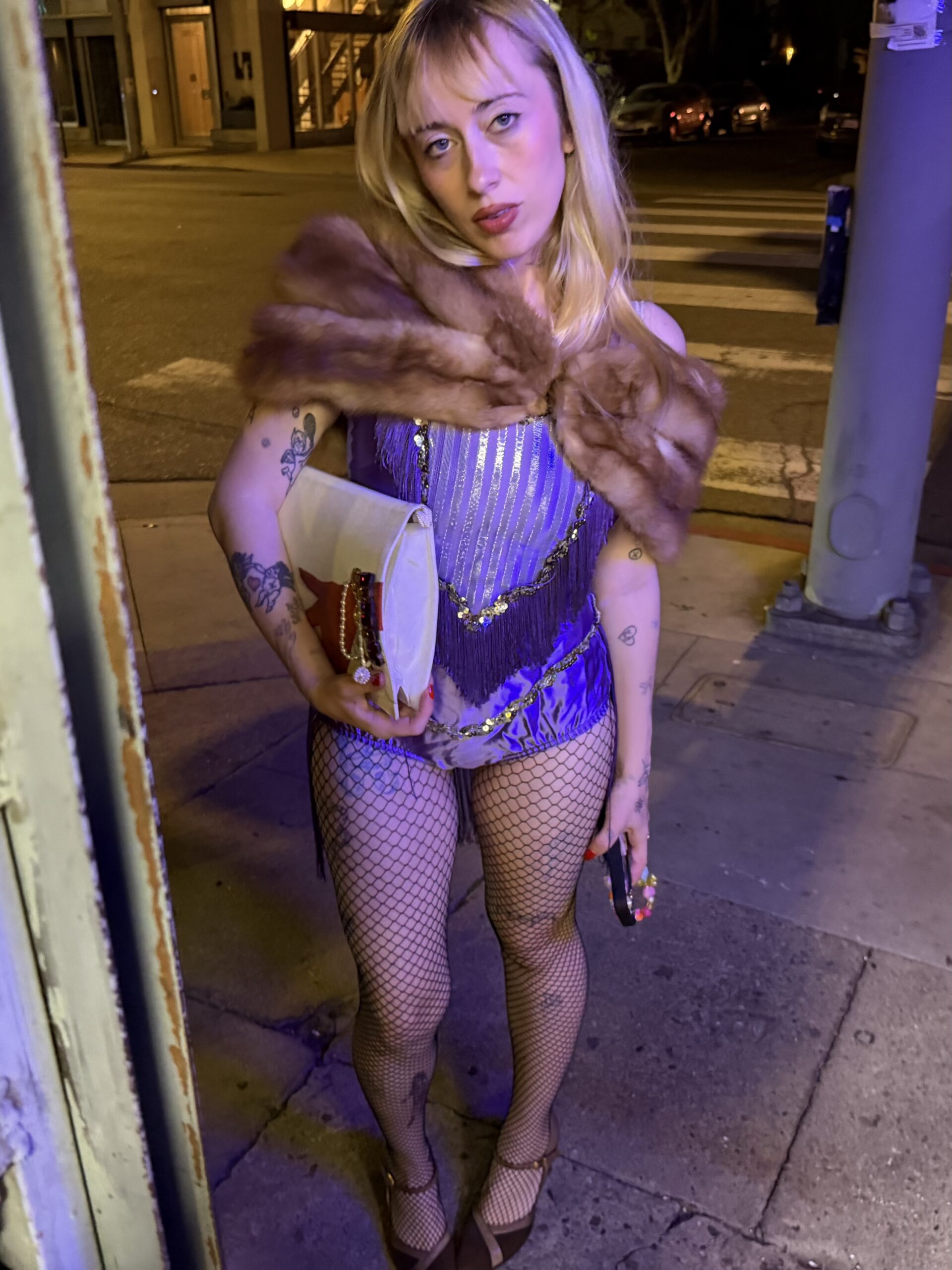 Harmony Tividad poses for a portrait in a vintage look