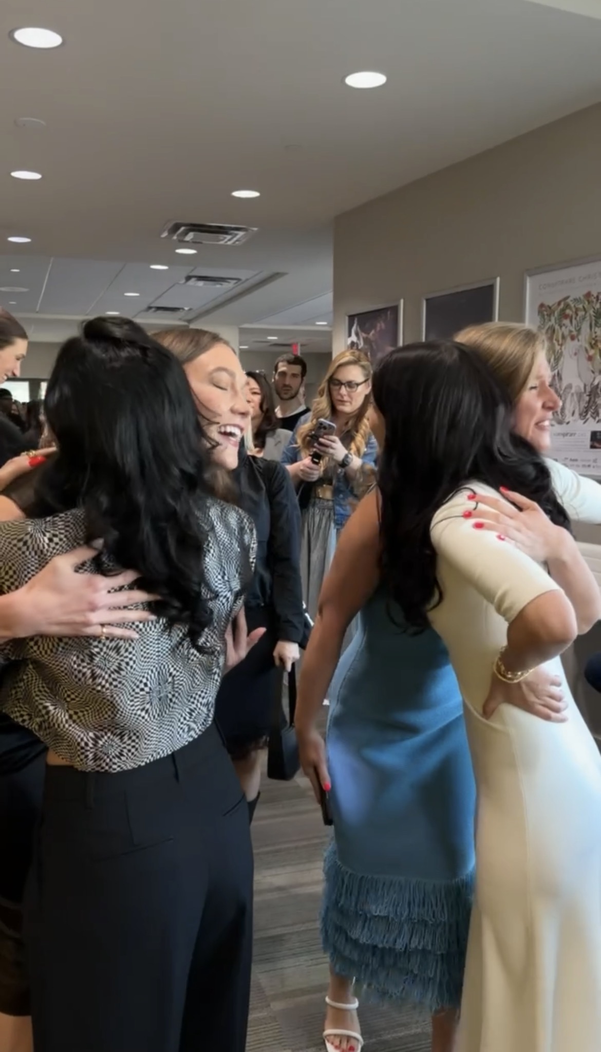 Phoebe Gates and Karlie Kloss embrace their peers ahead of a panel discussion