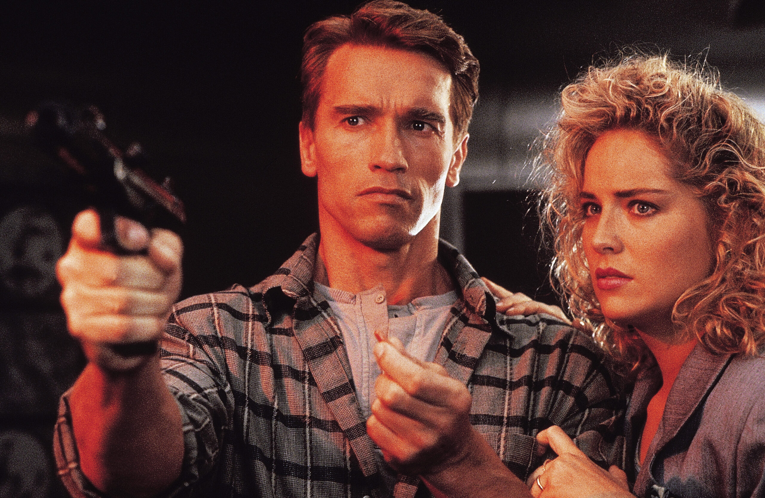Arnold Schwarzenegger and Sharon Stone in Total Recall, the film adaptation of a short story by Phillip K. Dick