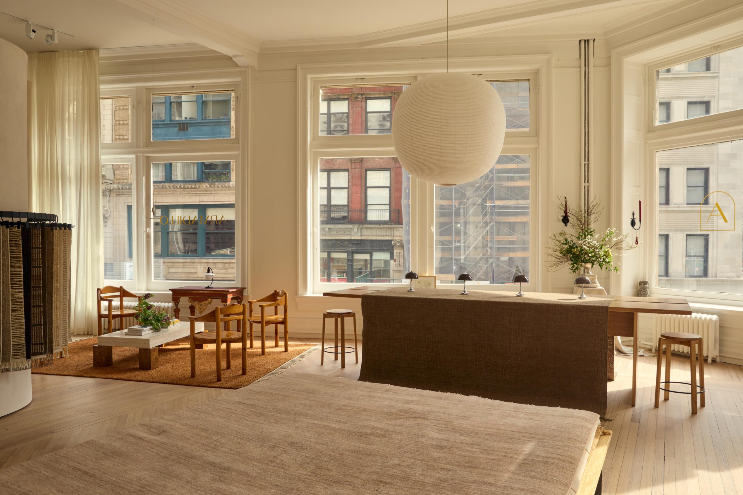 Rugs and curated furniture are displayed at the Armadillo flagship store