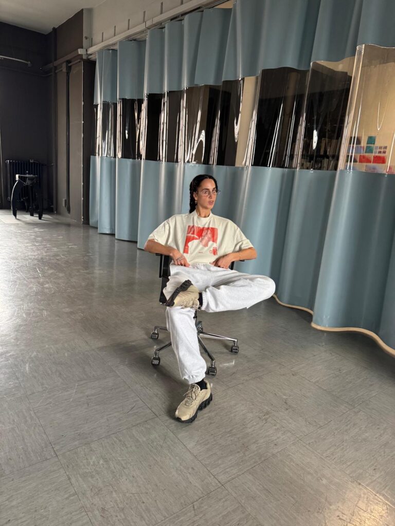 Sagg Napoli in her studio in running shoes