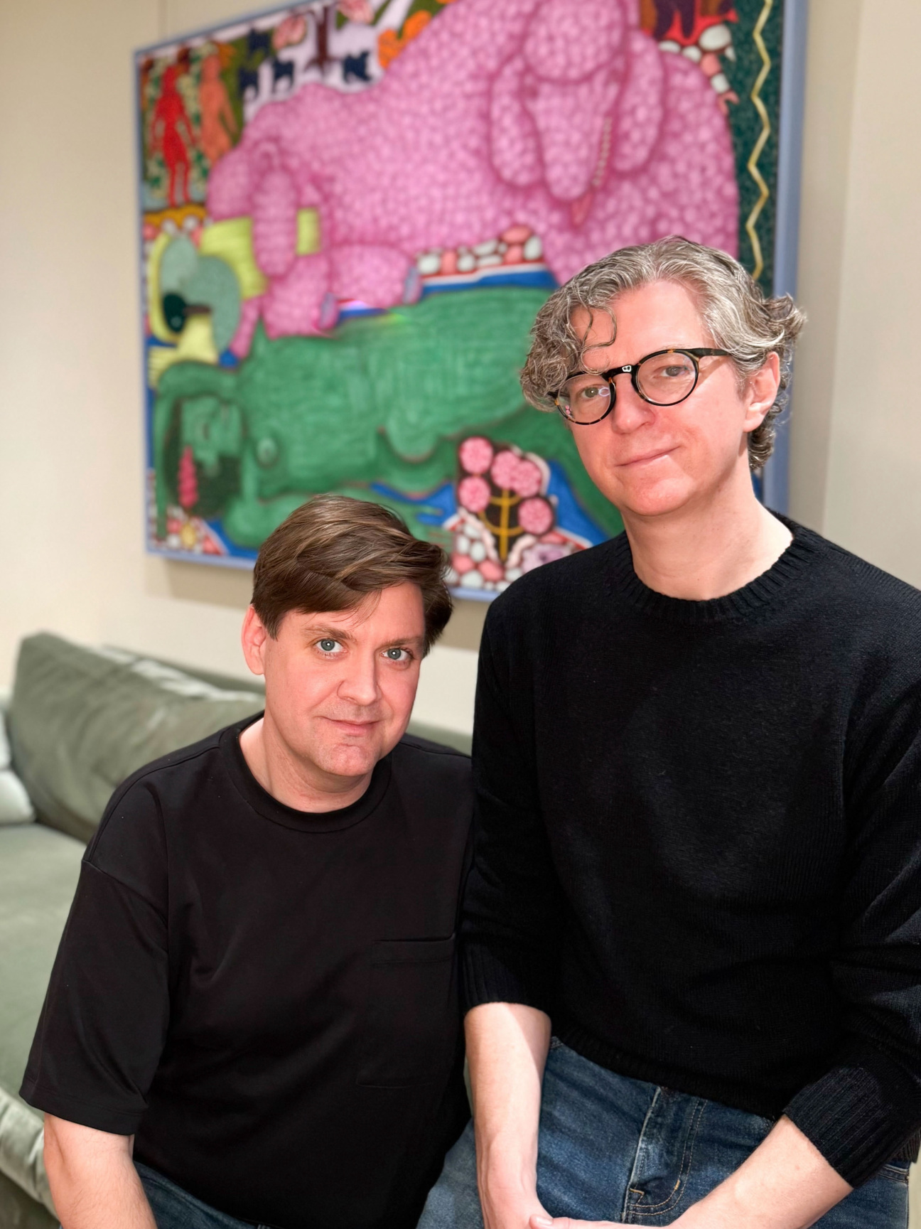 Rob and Eric Thomas-Suwall pose for a portrait at home