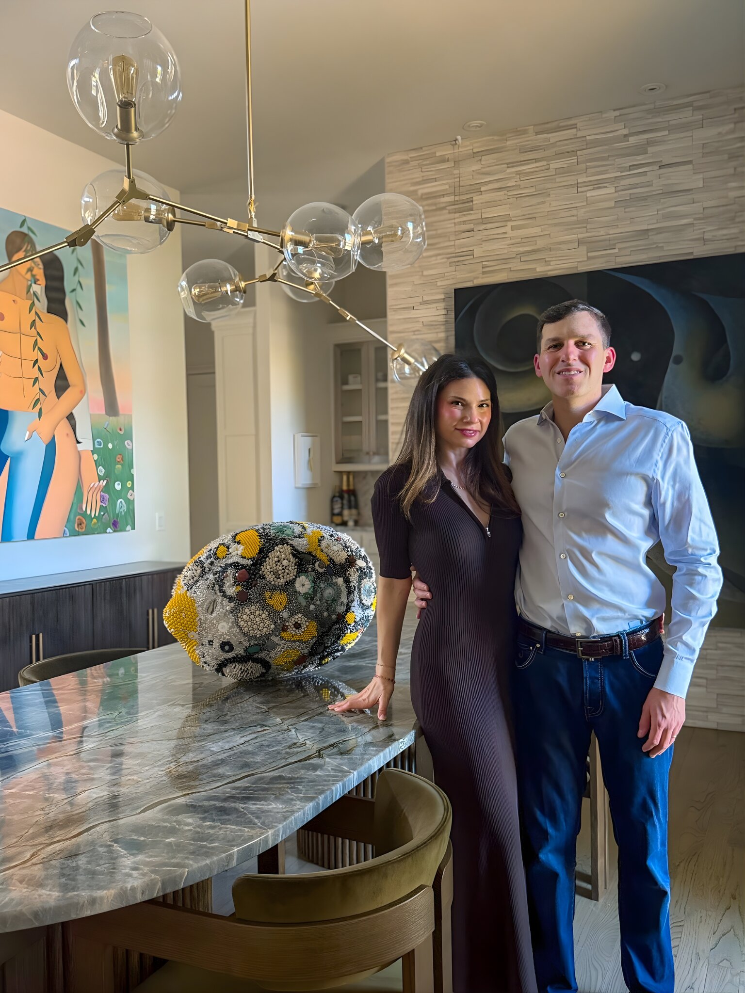 Adam and Rachel Green pose for a portrait in their Dallas home