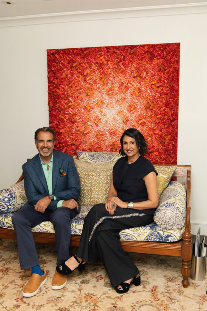 Gowri and Alex Sharma pose for a portrait at home in Dallas