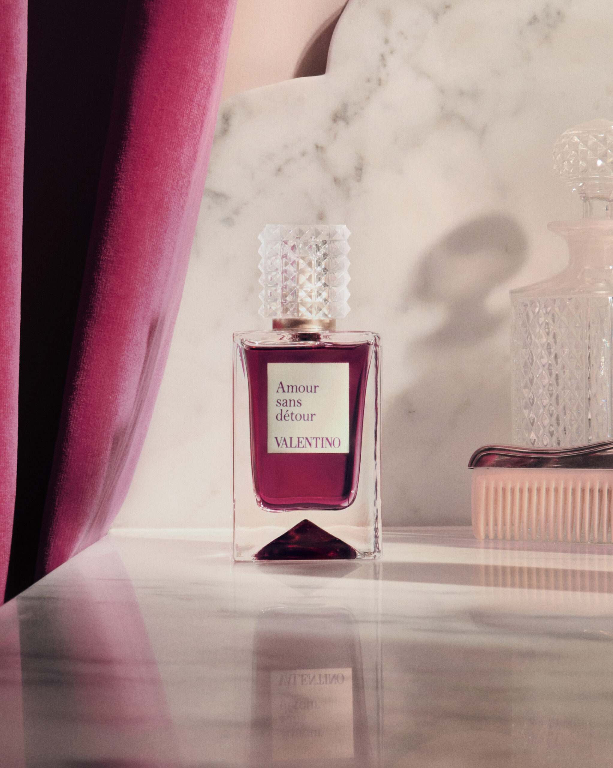 beauty-valentino-fragrance-perfumers-quotes A perfume bottle is positioned for Valentino's Analog of Dreams campaign
