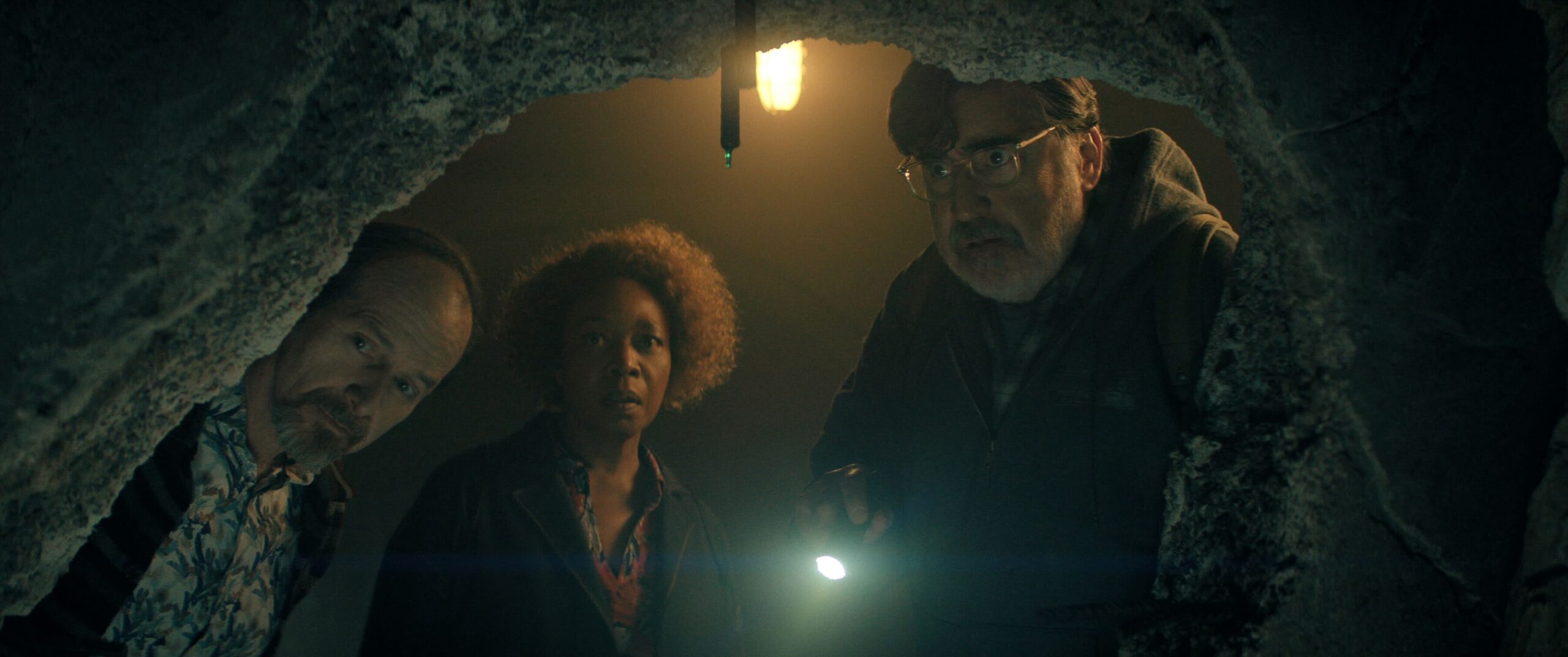 the-boroughs-tv-show-netflix Denis O'Hare, Alfre Woodard, and Alfred Molina in a cave in The Boroughs