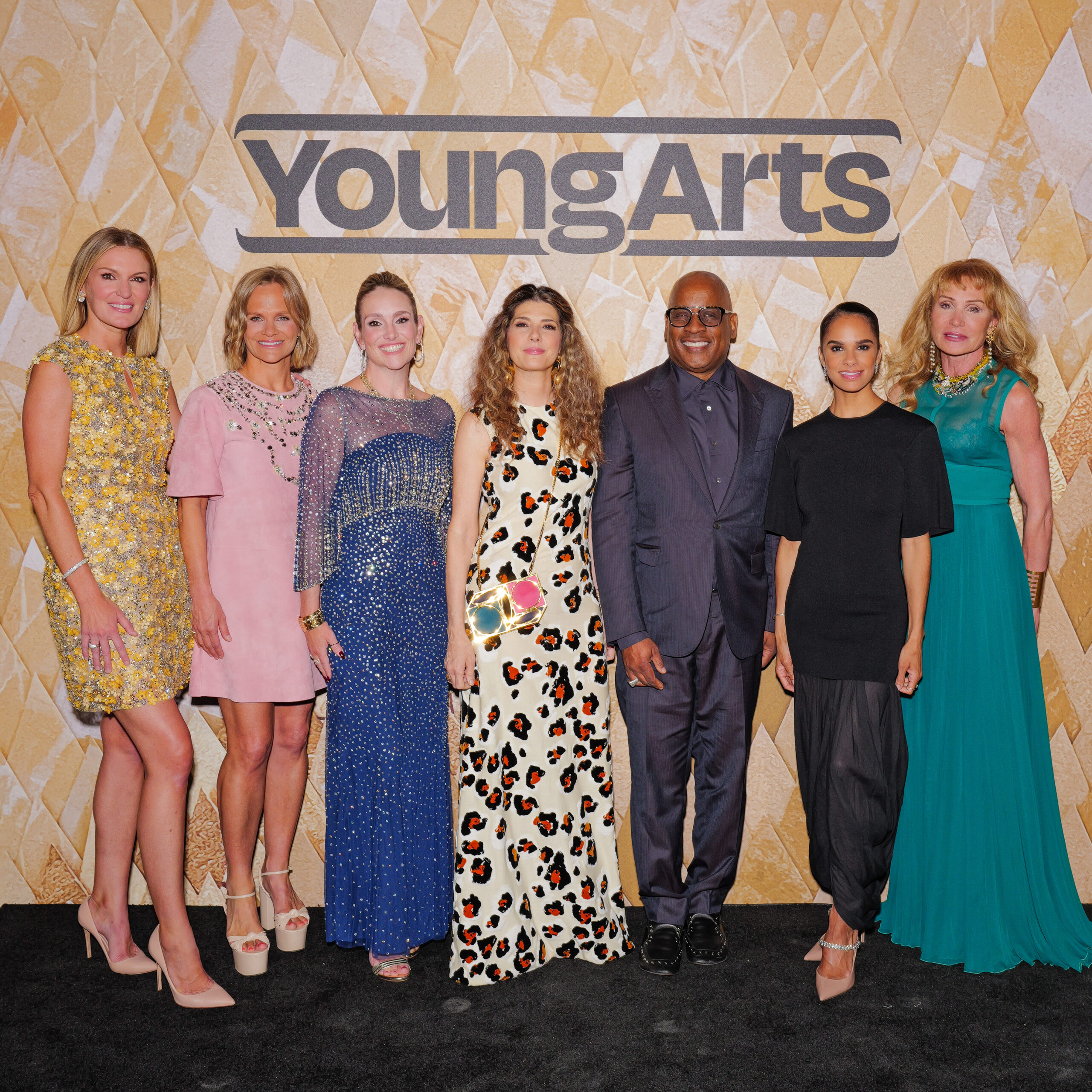 parties-young-arts-gala-2026-met-museum Sarah Arison, Michi Jigarjian, Gillian Hearst, Marisa Tomei, Glenn Ligon, Misty Copeland, Sandy Tamer pose for a portrait at the 2026 YoungArts New York Gala