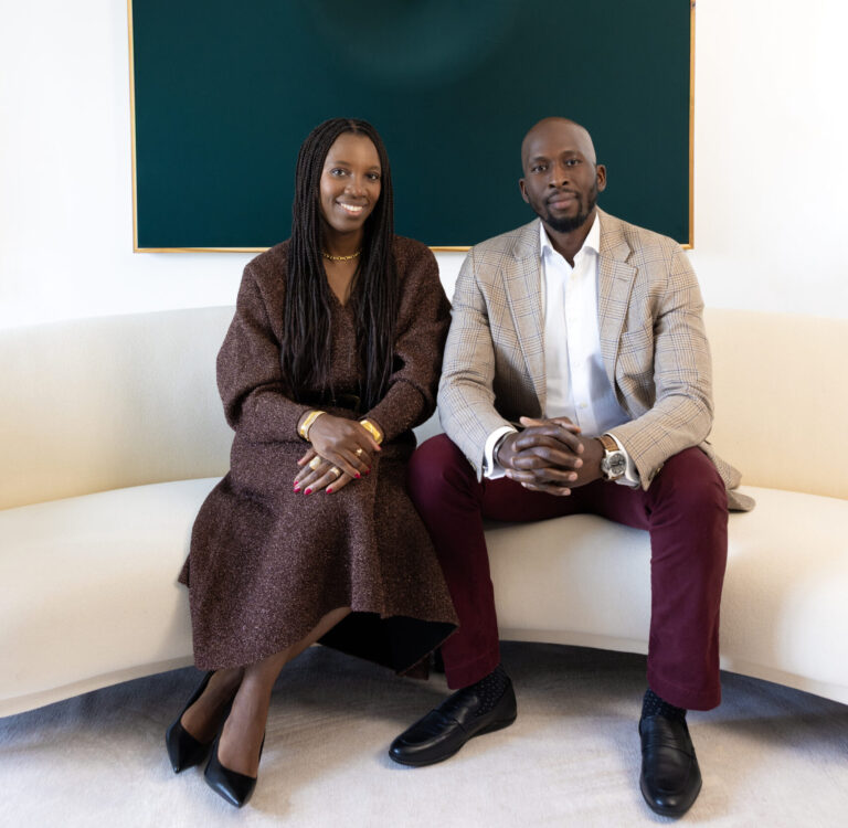 Mamadou-Abou Sarr and Catherine Sarr pose for a portrait in their Chicago home