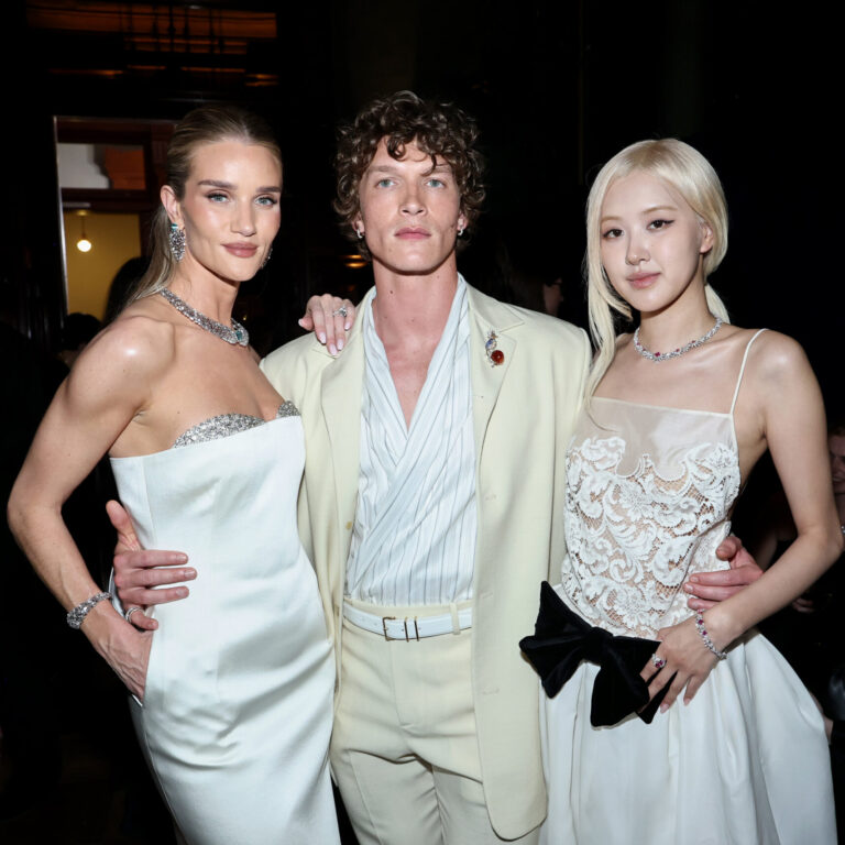 Rosie Huntington-Whiteley, Connor Storrie, and Rosé pose for a portrait