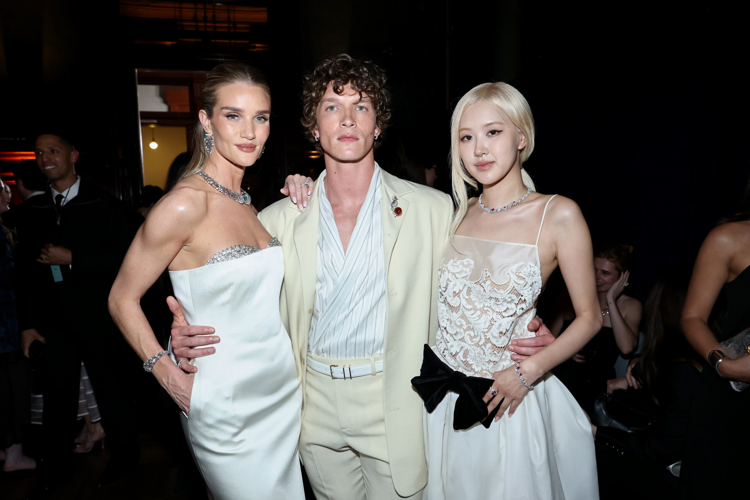 Rosie Huntington-Whiteley, Connor Storrie, and Rosé pose for a portrait