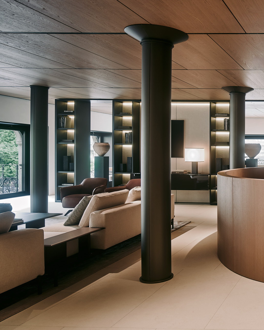 Sunlight filters through the Poliform flagship in Milan