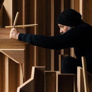 Jean-Guillaume Mathiaut poses at work on his Byredo collection