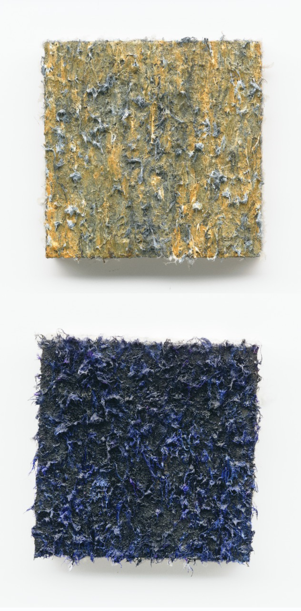 two square canvases with thick layered paint