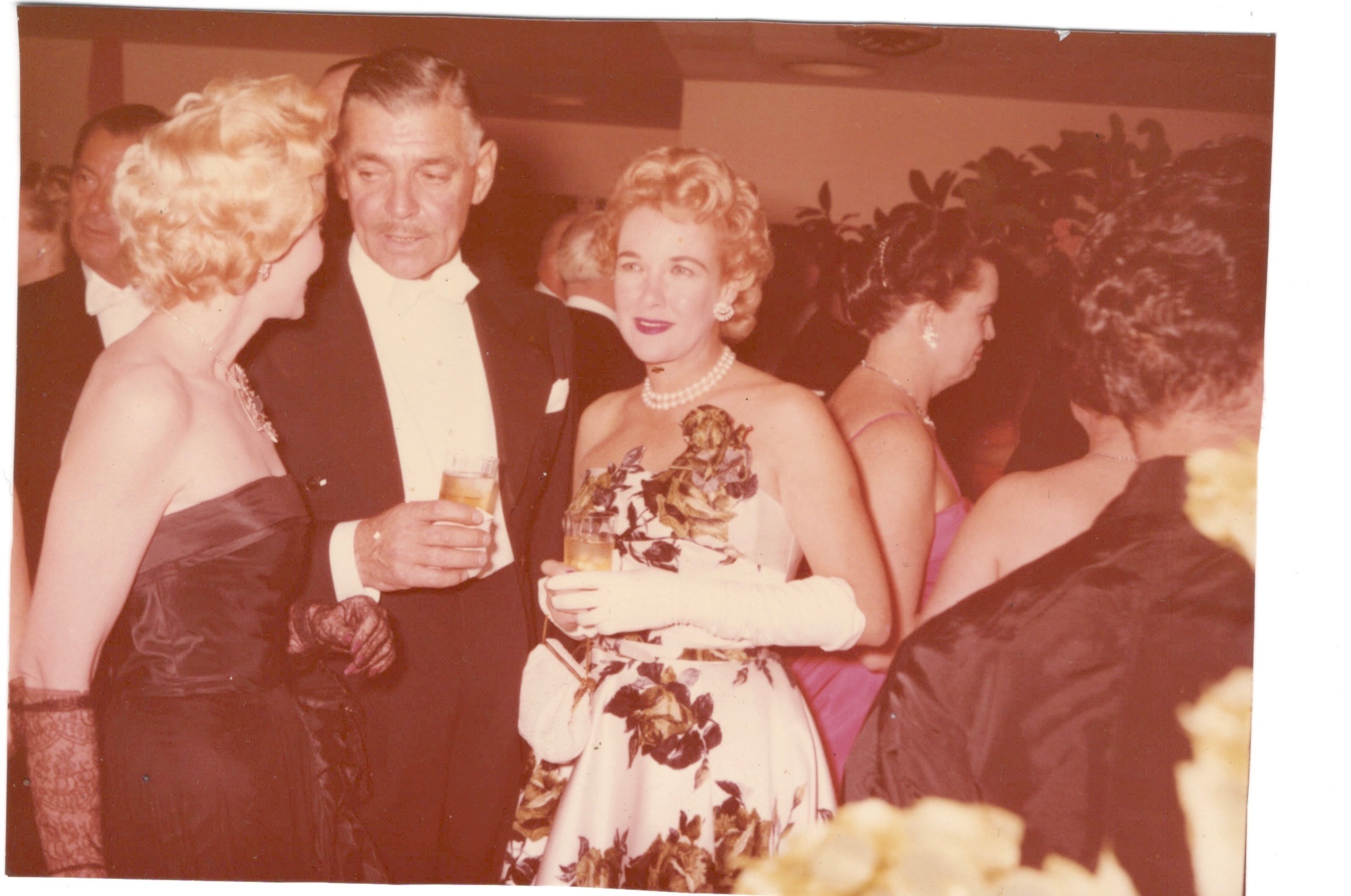 Golden age of Hollywood movie star Clark Gable, his wife ife Kay Williams Spreckles and Marilyn Monroe approx. 1954 in recently listed real estate Casa Contenta during the 1950s in Beverly Hills Los Angeles California.